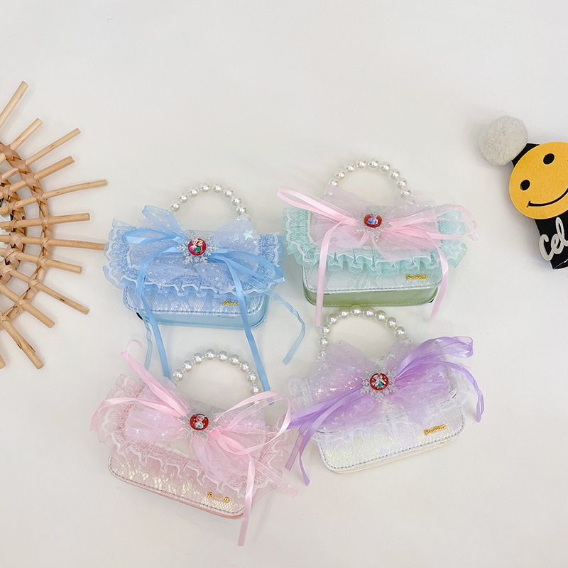 Bolsas para niños nuevas niñas bolsas de hombro lindas princesas bolsas de hombro de perlas de encaje bolsas de hombro al por mayor