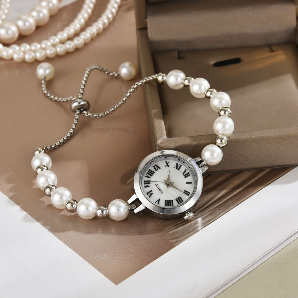 Reloj de cuarzo de ajuste libre perezoso, reloj de mujer, temperamento de nicho, lujo ligero, pequeña perla, reloj de pulsera romana, reloj de mujer