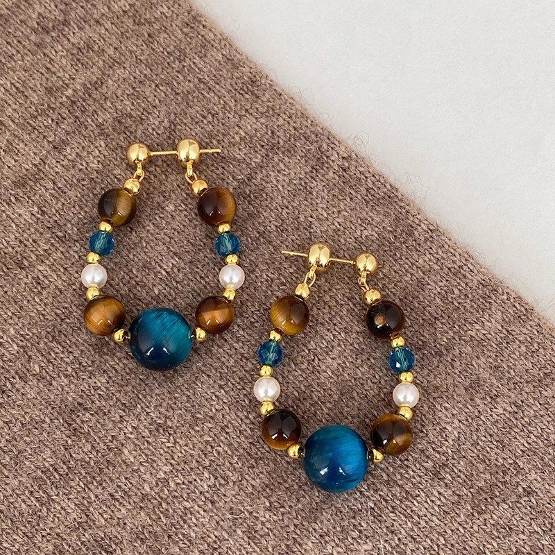 Pendientes de ojo de tigre artificial de color café Maillard con aguja de plata Pendientes simples y de moda de todo fósforo Pendientes ligeros de lujo de alta gama