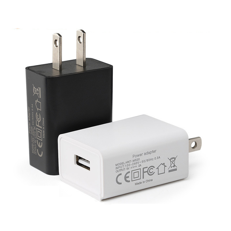 5V2A cargador de arroz 5V1A estándar americano multi-función de puerto único USB Android teléfono móvil carga cabeza adaptador de corriente