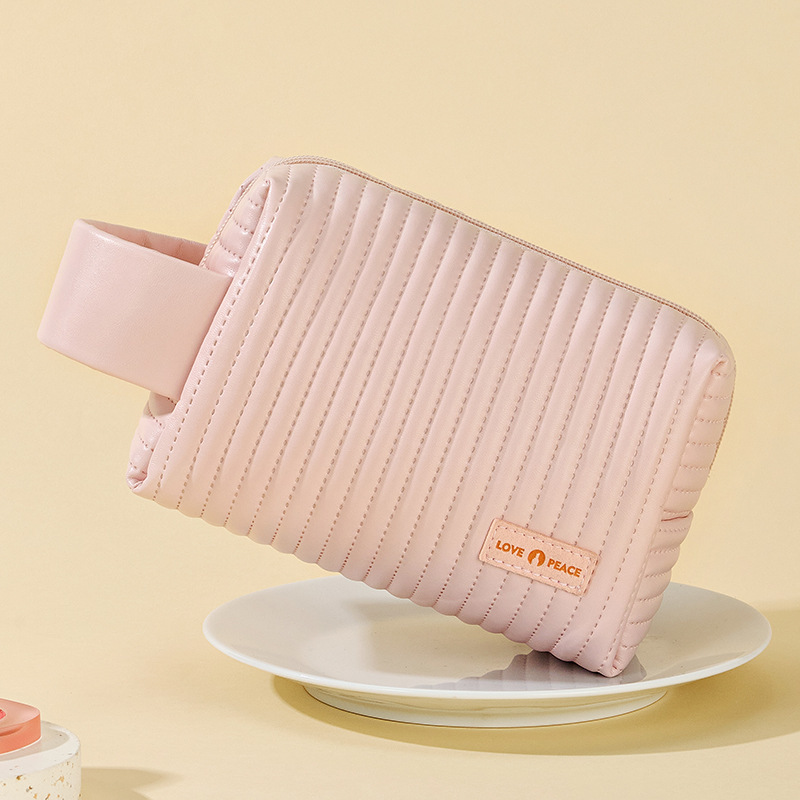 Nuevo pastel transfronterizo de octogón bolsas de maquillaje bolsas de maquillaje color caramelo bolsas de almacenamiento de viaje gran capacidad sensación de alta calidad al por mayor