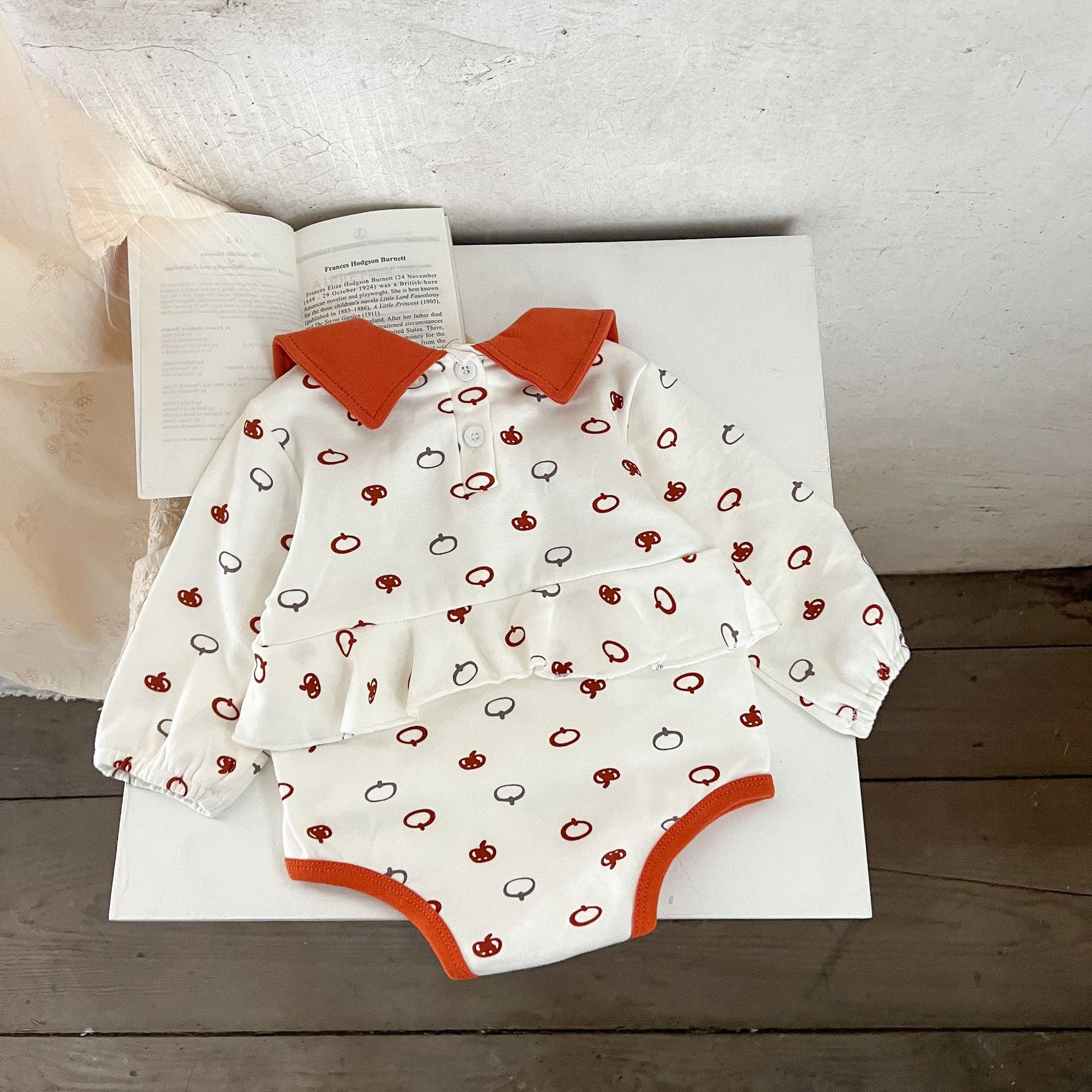 INS estilo coreano niñas calabaza impresión solapa color matching mameluco recién nacido versátil algodón casual mono