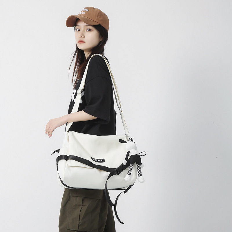 新款挎包男ins潮酷包网红学生时尚简约背包单肩大容量旅行斜挎包