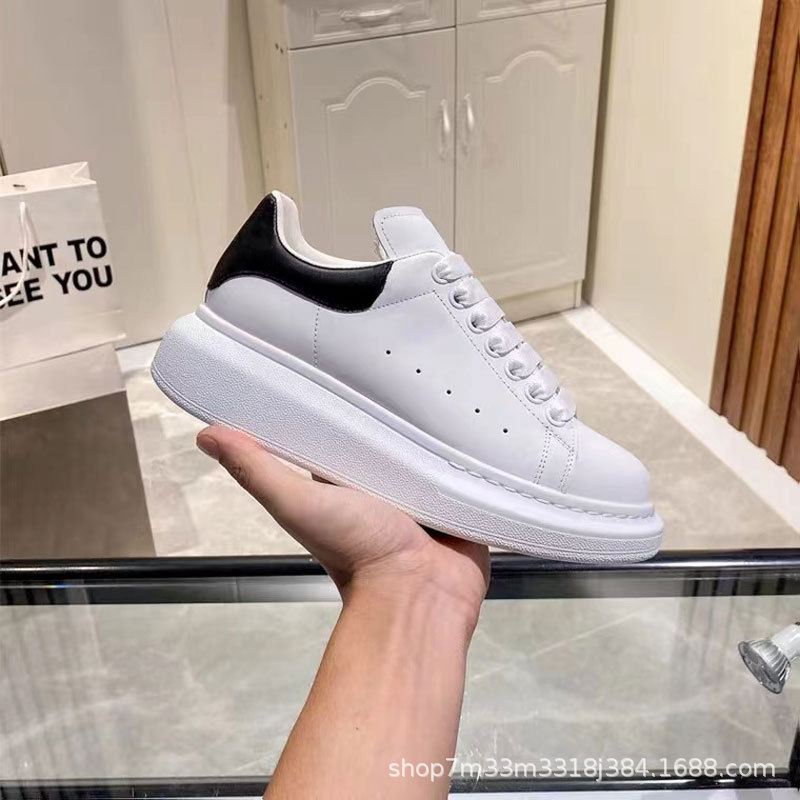 2024 New genuine leather all-match thick-soled Hualun macquonda white shoes women's height increasing laser black tail casual board shoes