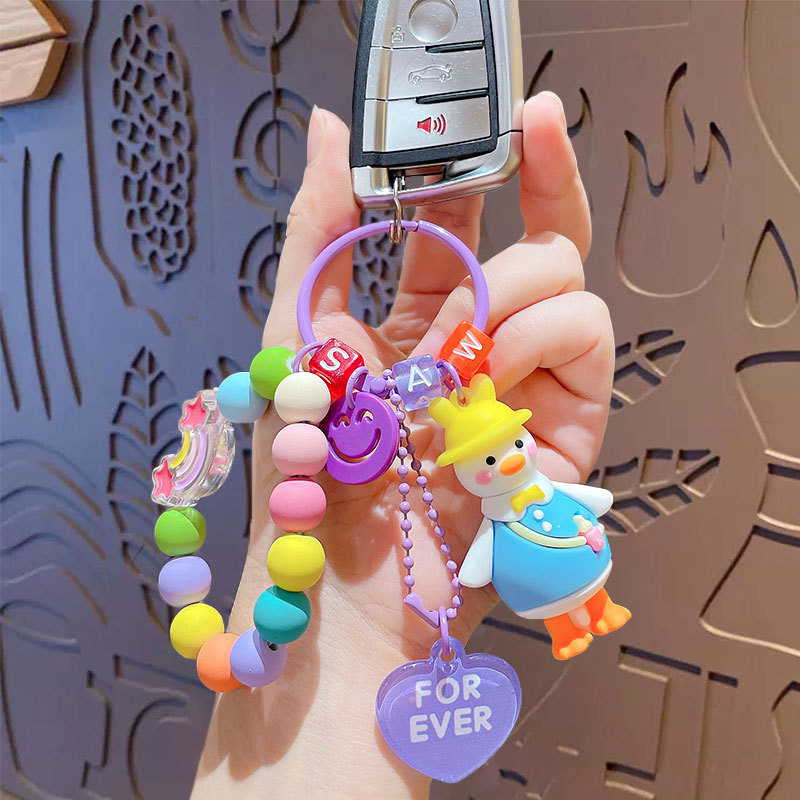 Caricatura creativa adorable pato cuentas colgante de cadena para mujeres lindas parejas llaveros bolsos colgantes pequeños regalos