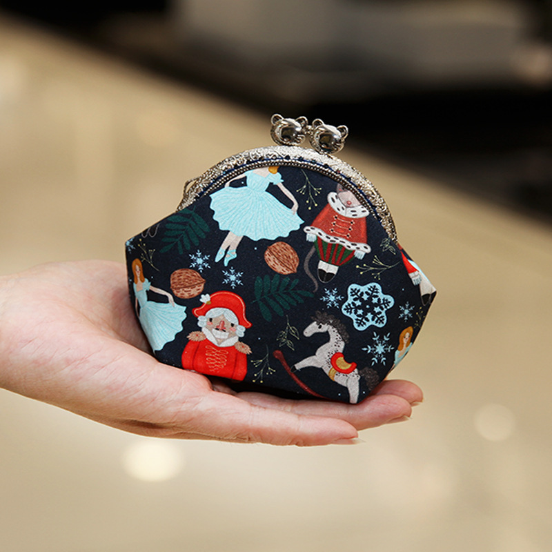 Bolsa de material de bordado bricolaje hecho a mano 8,5 boca Bolsa de Oro patchwork bolsa antigua bolsa transfronteriza inglés gato bolsa de almacenamiento