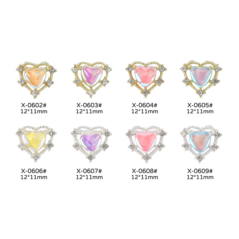 Nueva joyería de uñas Rojas netas Nueva Aurora en forma de corazón de diamantes de oro y plata Corazón de melocotón Diamante grande linda chica bonita yema de los dedos decoraciones