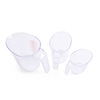 White transparent handheld measuring cup scaled, plastic material, tools set