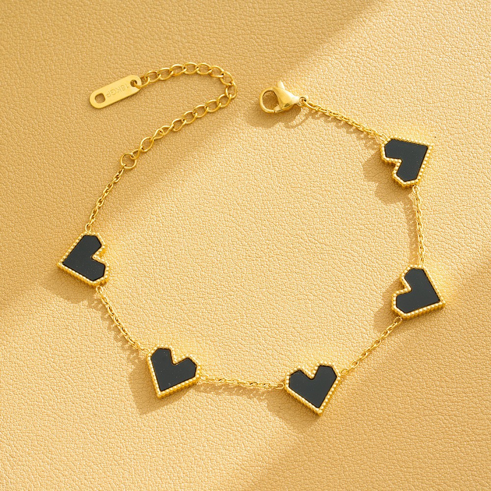 Pulsera de trébol de acero titanium vendedora caliente transfronteriza europea y americana con incrustaciones de concha pulsera colgante pulsera de diseño avanzado sin desvanecimiento al por mayor