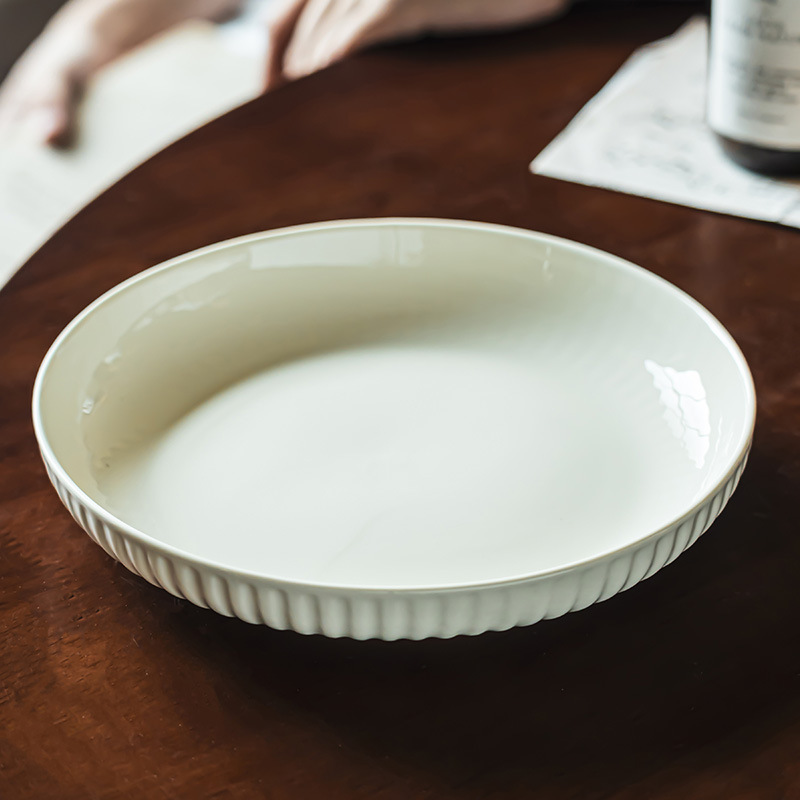 Plato en relieve lleno de sentido del diseño, plato de postre de estilo retro, plato de carne occidental sencillo para el hogar, plato de arroz, vajilla