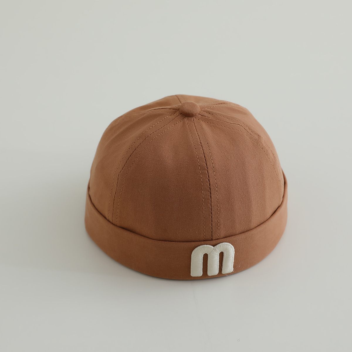 letras coreanas m niños terratenientes sombrero primavera y otoño modelado cóncavo de moda para hombres y mujeres bebés sombrero de tela de color sólido