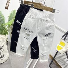 男童破洞黑白純色長褲2021春夏季新款彈力牛仔韓版修身款時尚長褲