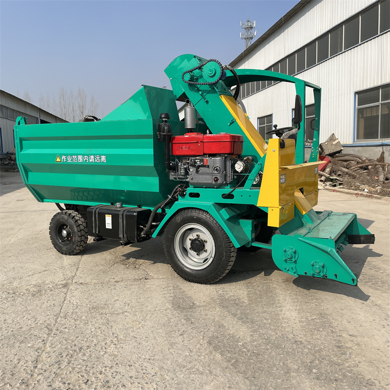 60马力四驱铲粪车图片粪渣自动牧场铲粪车畜牧加大料箱刮板出粪车
