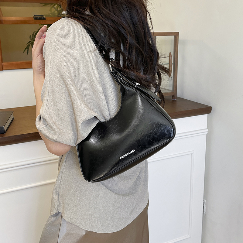 Cross-border coreano de alta calidad bolso de brazo portátil para mujeres 2025 nueva moda de invierno simple bolso de hombro de moda