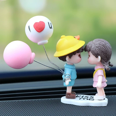 Personality Colorful Balloon Couple: Other Automotive Interior Supplies - couple-in-yellow-hat-and-blue-clothes-with-base-pink-and-white-balloons