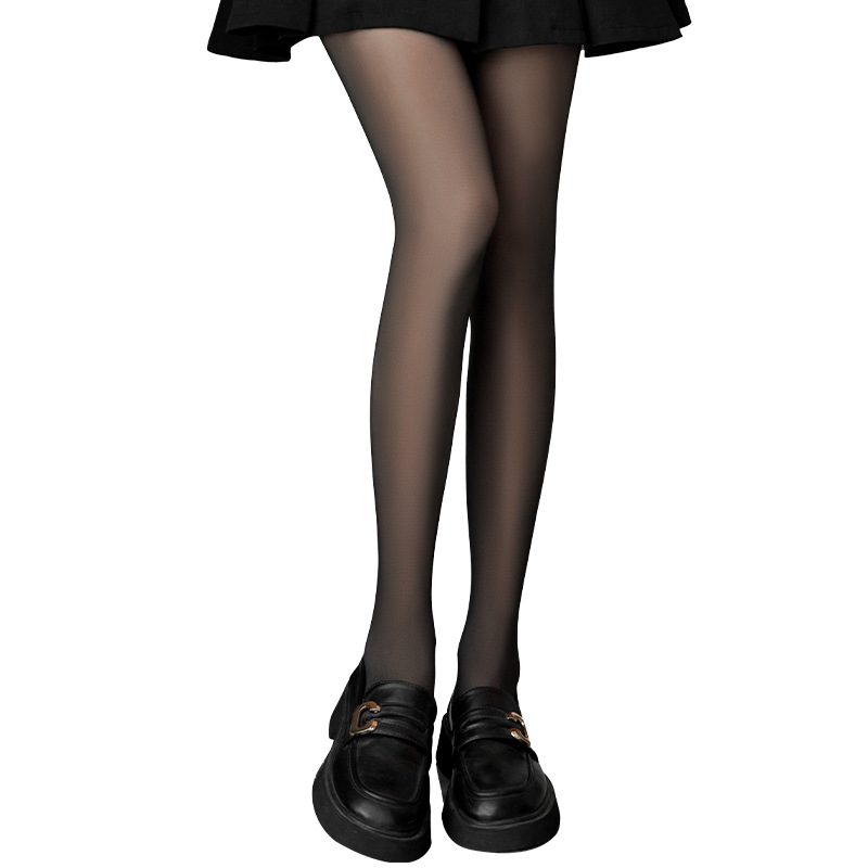 Leggings de piel oscura para mujeres otoño y invierno con seda negra piernas desnudas artefacto de cintura alta, caderas gruesas y calentadas.