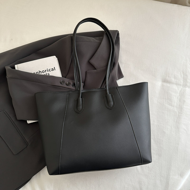 Bolsa de mano de textura de viaje casual otoño / invierno 2024 nuevo estilo coreano simple bolso de hombro axilar temperamento bolso especial