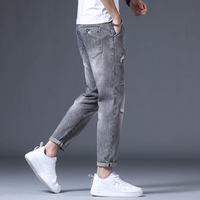 New spring and autumn men's jeans Korean version of fashion ripped jeans slim stretch men's jeans