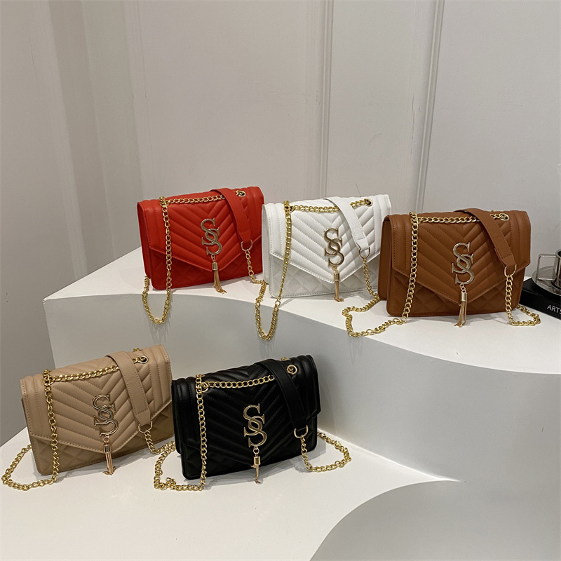 Cadena de hendidura de diamante bolso de hombro para mujeres 2025 primavera y verano nueva moda simple tendencia brazo bolso