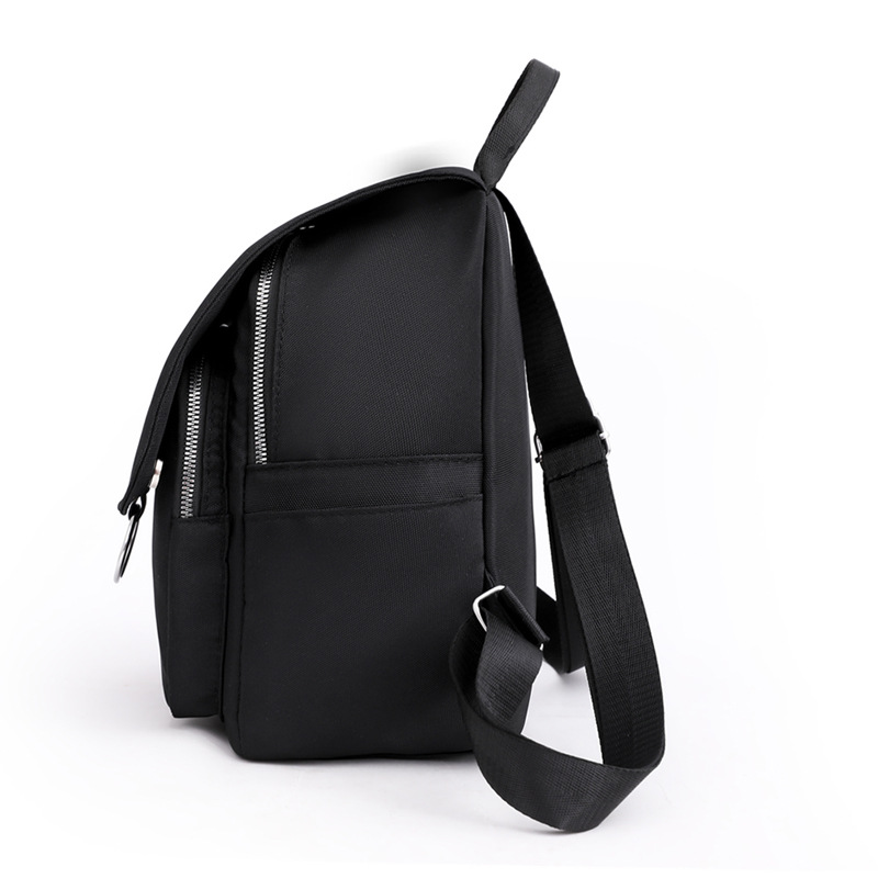 Comercio exterior al por mayor 2022 nuevas señoras casuales mochila de tela Oxford color sólido salvaje mochila de viaje urbano