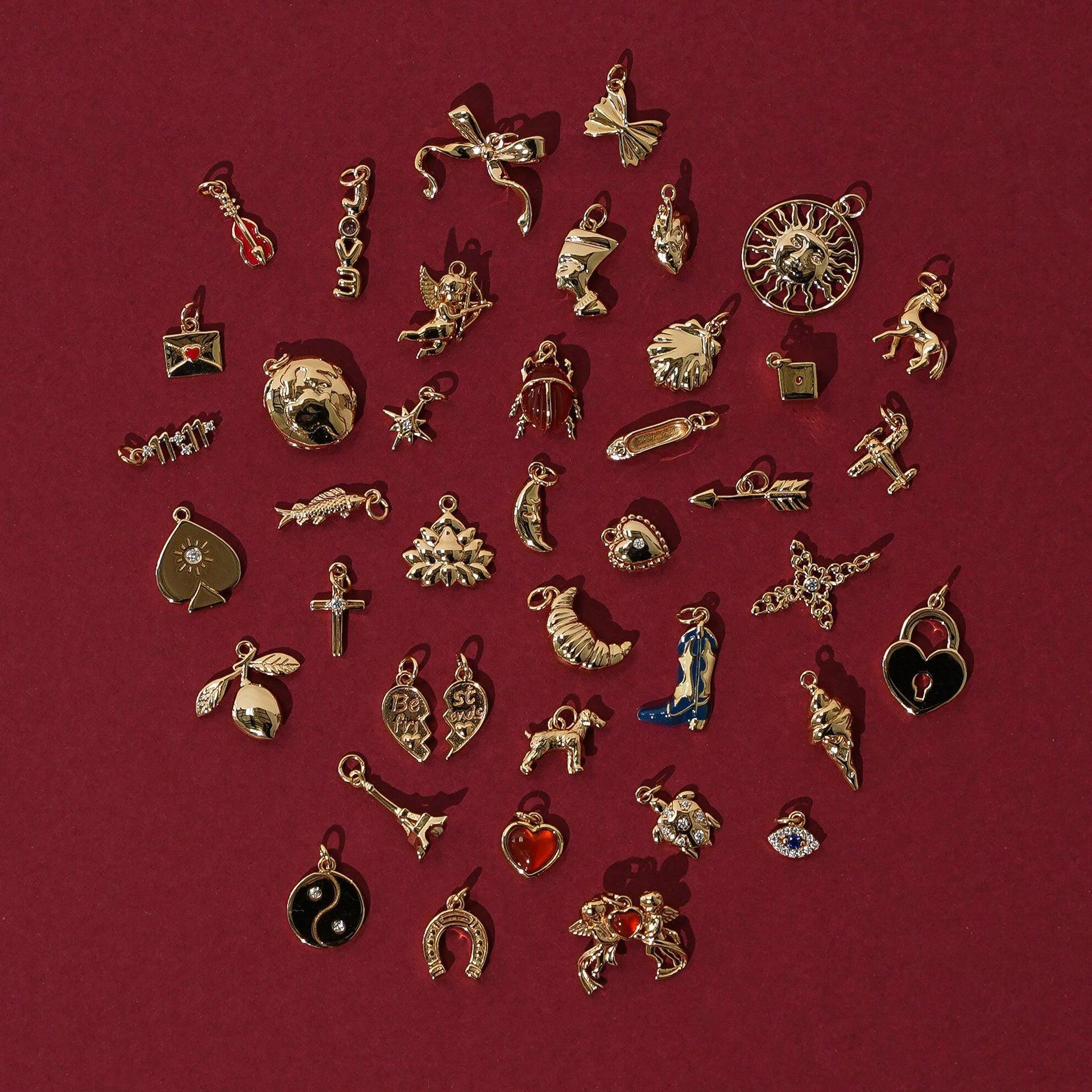 小吊坠项链爱心diy锆石项链女蝴蝶靴子十字架太阳手链女钛钢复古