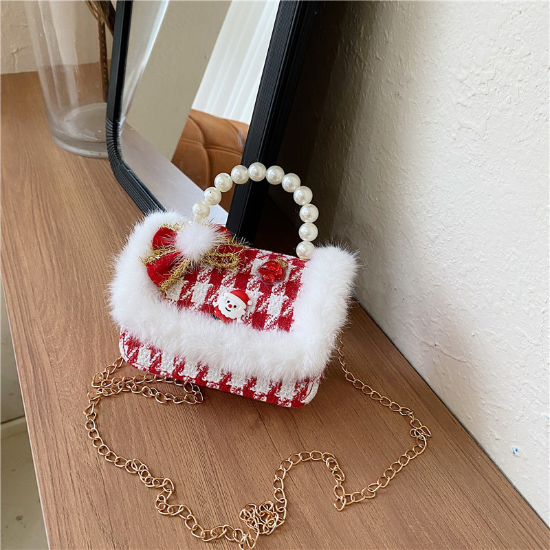 Mini moda para niñas bolso de cambio de perlas 2024 nuevo patrón de moda coreana bolso de ropa infantil