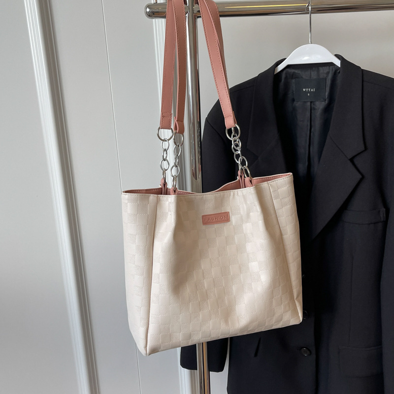 Bolsa de hombro a cuadrillas de alto nivel 2024, nueva bolsa de viaje simple de gran capacidad para estudiantes universitarios.