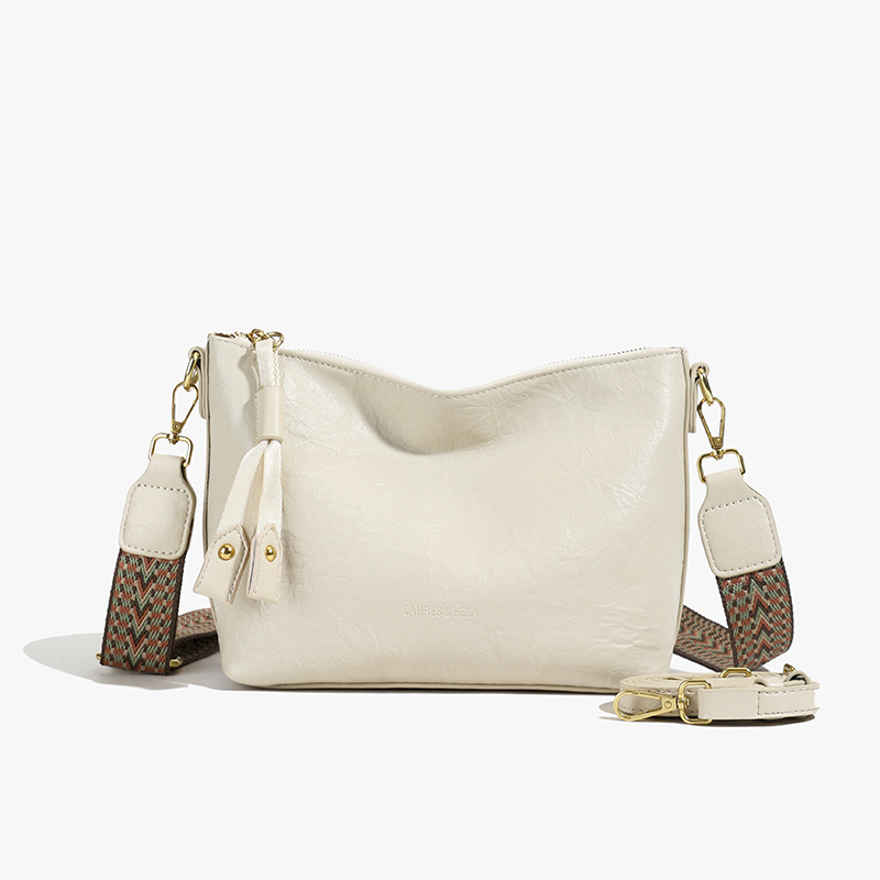 Bolsa de alta sensación de comercio exterior para mujeres 2025 nueva moda simple bolso de hombro de viaje casual bolso de cubo de agua