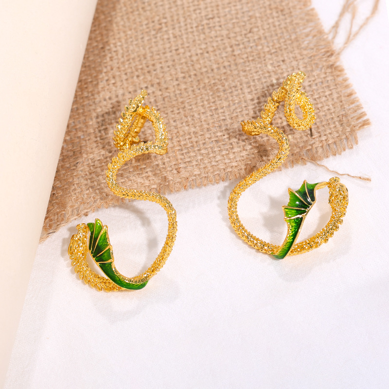 Nuevo cross-border personalizado flying dragón auriculares nicho de moda retro diseño sin agujeros de orejas para hombres y mujeres usar auriculares de alto nivel