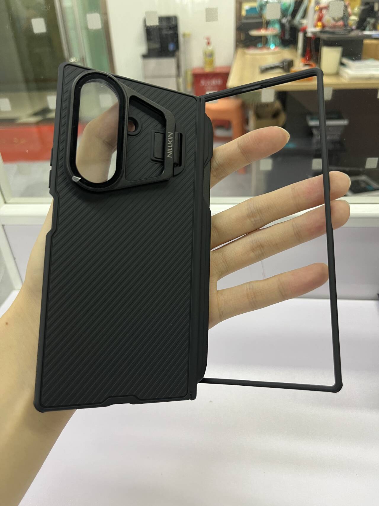 Ốp lưng gập Nillkin cho Samsung Z Fold có nắp gương trong suốt, chân đế và ngăn đựng bút W26 — Gương đen Prop cầm bút-Nắp gương trong suốt-Đen, Gương đen Prop [Phiên bản từ tính] Nắp gương trong suốt cầm bút-Đen, Gương đen Prop [Phiên bản từ tính] Nắp gương trong suốt cầm bút-Màu đen trong suốt, Samsung Z Gấp 7 5G/W26 chi tiết 21