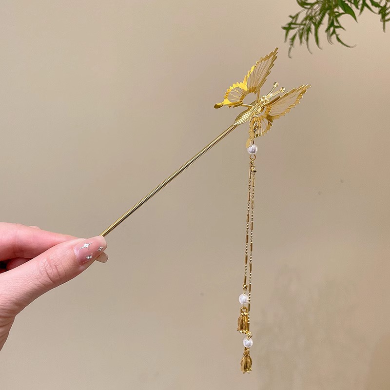 32 ¿ horquilla con borlas de mariposa - dorada (en bolsas)