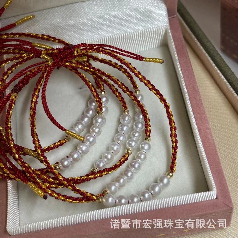 새해 선물 신선한 물 진주 팔찌 18K 둥근 차가운 빛 완벽한 손으로 짠 빨간 로프 진주 팔찌