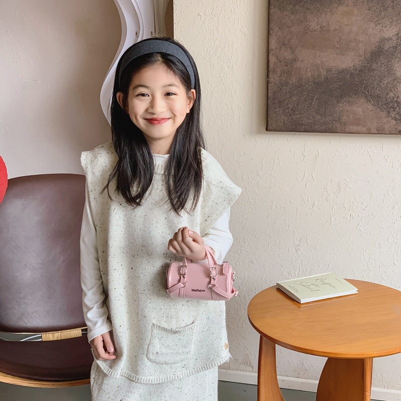 Coreano simple color sólido bolsas de hombro para niños y niñas bolsas de cilindro mini compactas para bebés bolsas de almohada para niños de comercio exterior transfronterizo