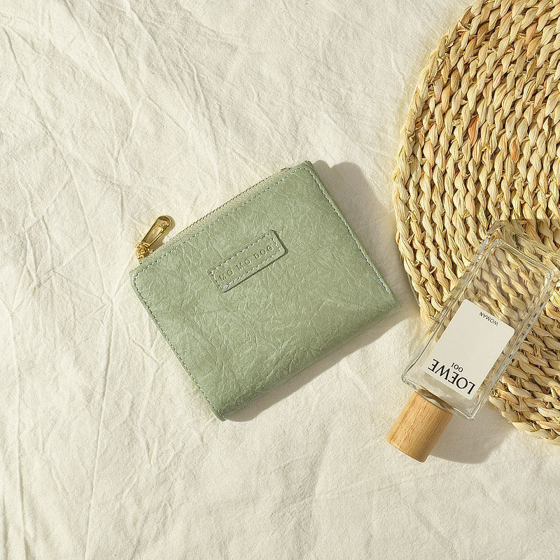 Nuevo retro pequeña cartera ~ ins cartera femenina corto estudiante europeo y americano fresco plegable simple hebilla artística