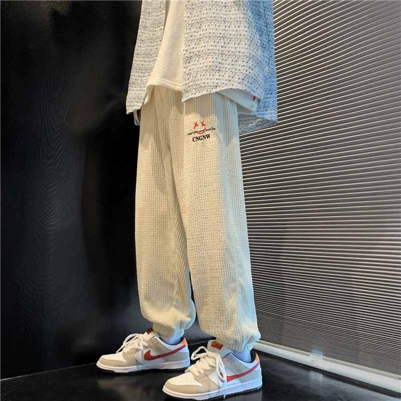 Весенние и осенние вафльные брюки мужские джинсы прилив свободные штаны повседневные брюки корейского тренда дикие спортивные штаны