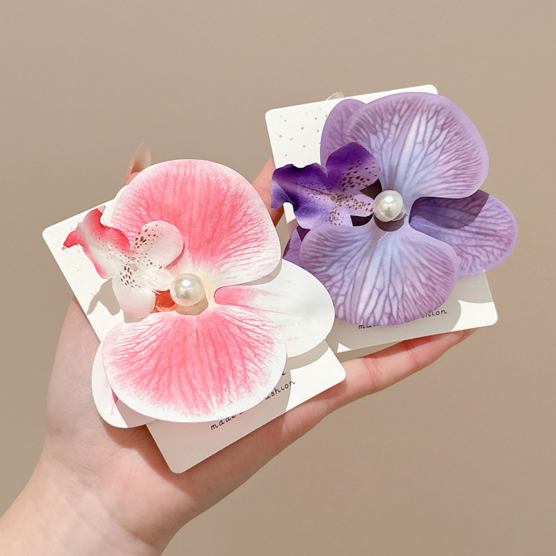 Butterfly orchid clip para el cabello de vacaciones en el mar de mujeres sensación de atmósfera de simulación flores clip de boca de pato props de fotos clip de tocado clip para el cabello