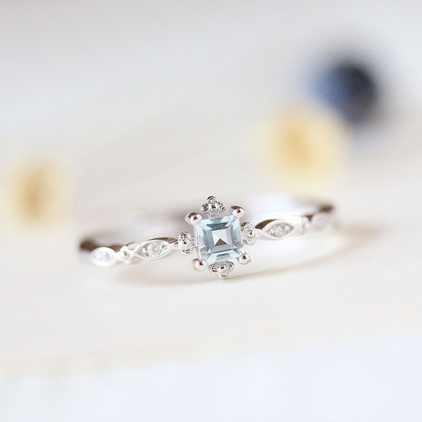 Yunjin transfronterizo nuevo pequeño anillo elegante fresco europeo y americano nicho diamante incrustado Topacio mar azul circón anillo