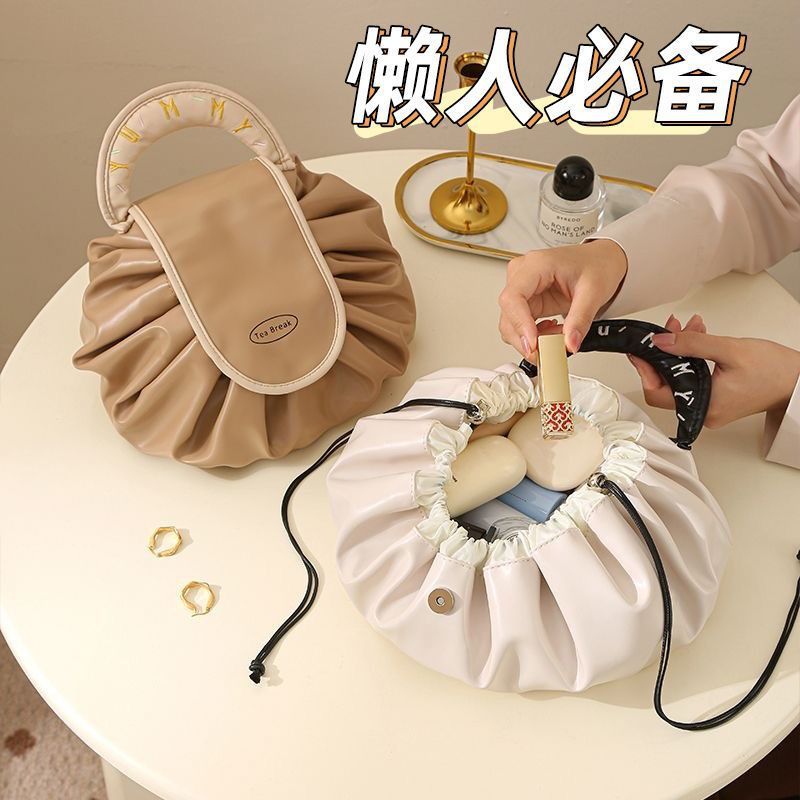 Perezoso 2025 nuevo paquete de maquillaje impermeable de gran capacidad portátil bolsa de almacenamiento de viaje cuerda de bombeo para lavar