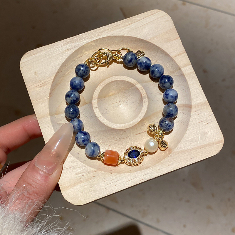 Pulsera de granate de ojo de tigre de cristal natural, nueva pulsera de todo fósforo de estilo nacional de estilo chino, joyería de novia de alta gama de lujo ligero
