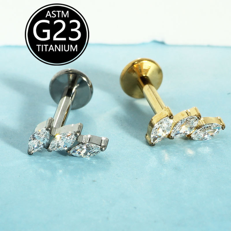 Silver pointed spike labret stud material detail