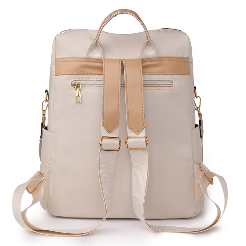 Bolso mujer 2023 nueva mochila casual para mujer con borla de nailon simple color de contraste mochila ligera multifuncional marea