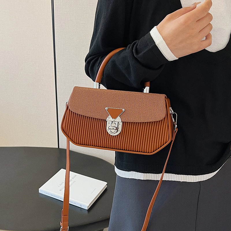 Bolso de moda transfronterizo 2025 verano nuevo bolso femenino de alta calidad textura bolso de hombro bolso de mensajero a rayas de moda marea