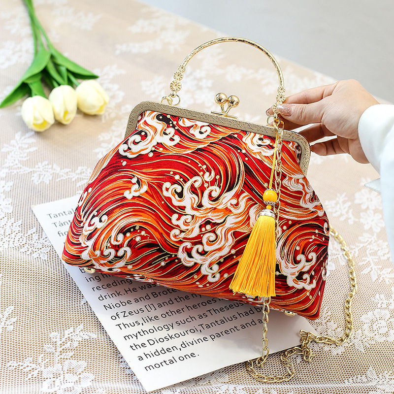 Bolso cruzado de un solo hombro estilo antiguo a juego bolso cheongsam bolso transfronterizo nuevo estilo retro estilo chino bolso portátil de oro de boca terminado