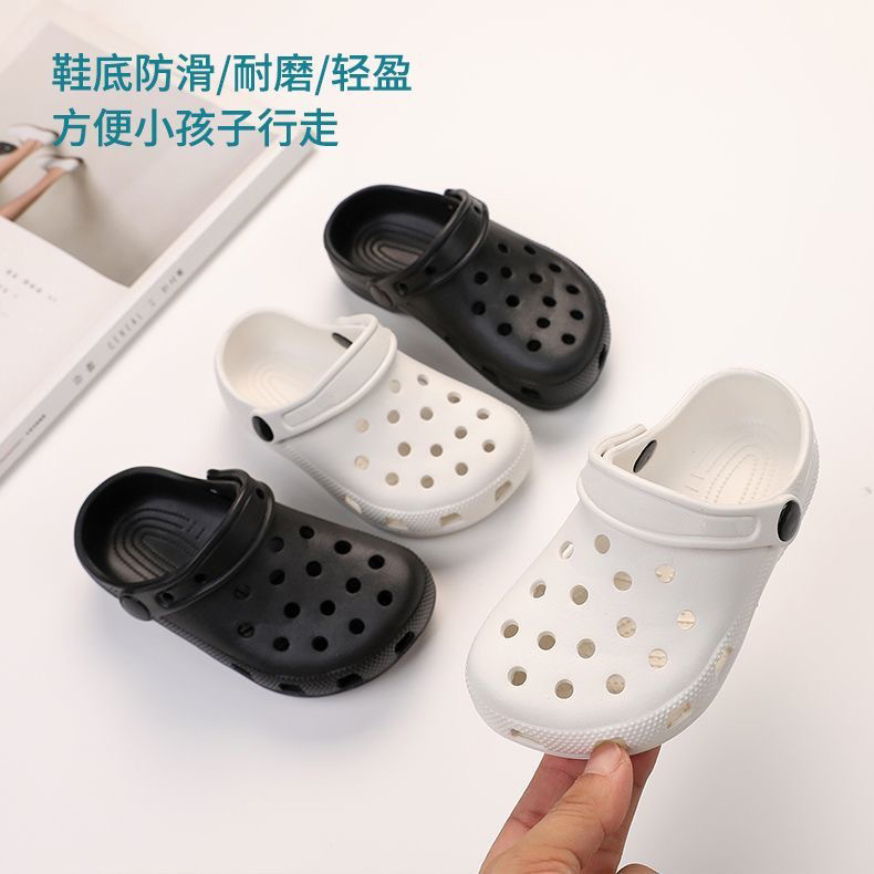 Children's white Crocs-style slippers