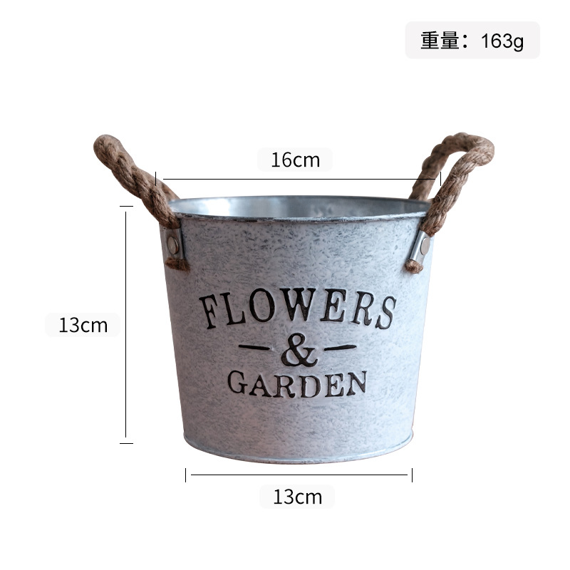 Macetas y cubos de hierro vintage para exportación, macetas decorativas redondas de hojalata con acabado envejecido para plantas verdes y suculentas.