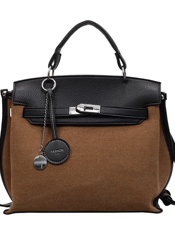 Bolso para mujeres 2026 nuevo cross-border lienzo empalme color contraste bolso de mano alta sensación retro mochila de hombro