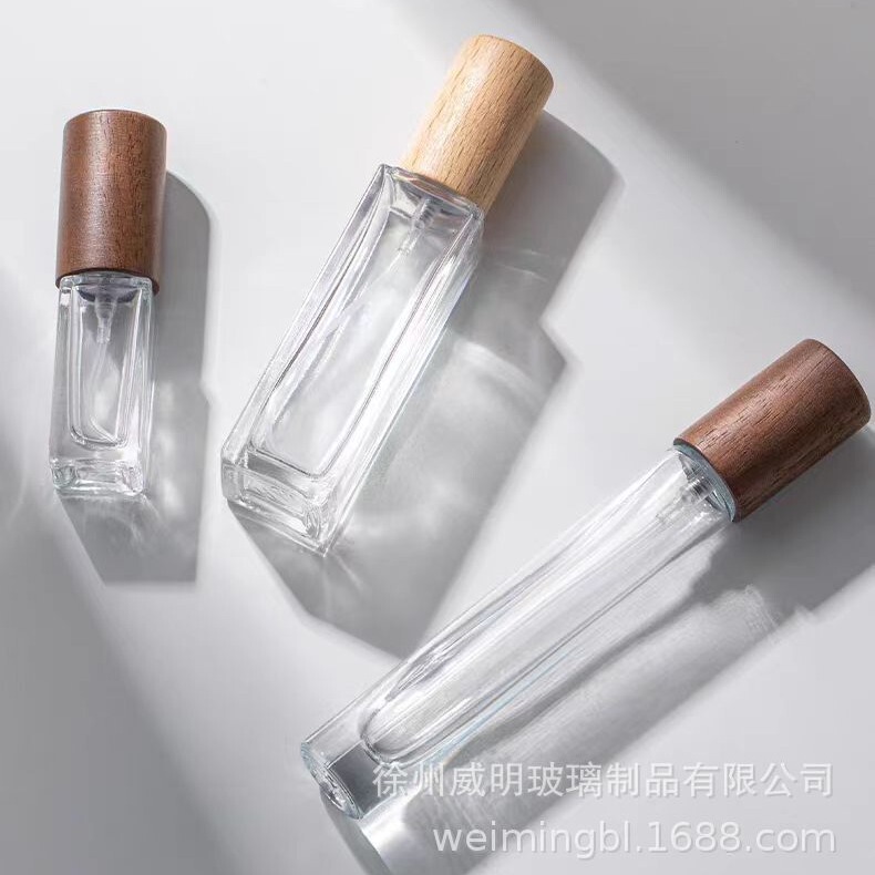 Perfume sub-bottle high-end portable 10ml small sample bottle glass spray bottle replacement bottle solid wood cover empty bottle