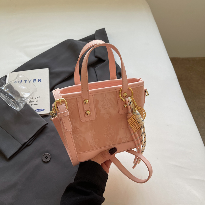 Bolso de mano/bucket bag de moda coreana 2025 para mujer, diseño con relieve, textura de alta gama, versátil, también cruzado