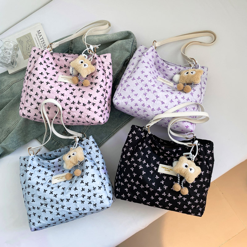 Bolso de tote 2025, primavera y verano, nuevo tipo de bolso de hombro, moda, bolso de mano, bolso de viaje de estilo extranjero para mujeres.