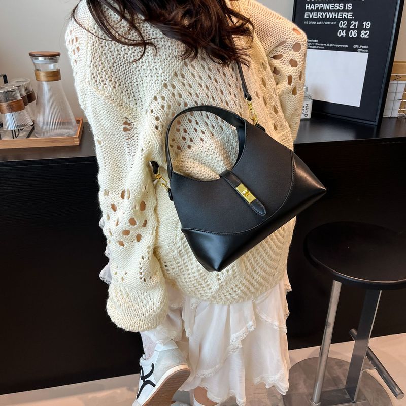 感撞色小众设计包包女2025新款水饺包百搭通勤手提斜挎腋下包|undefined